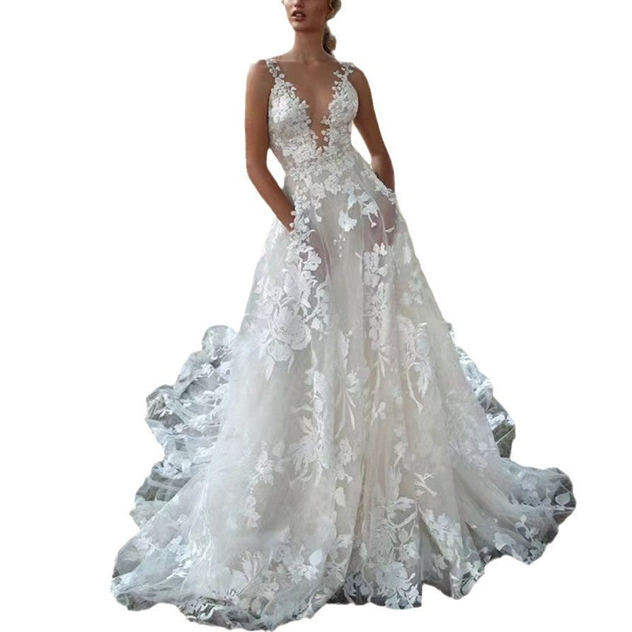 Women's V-Neck Sleeveless Lace Flowing Wedding Gown ¨C Elegant Bridal Dress